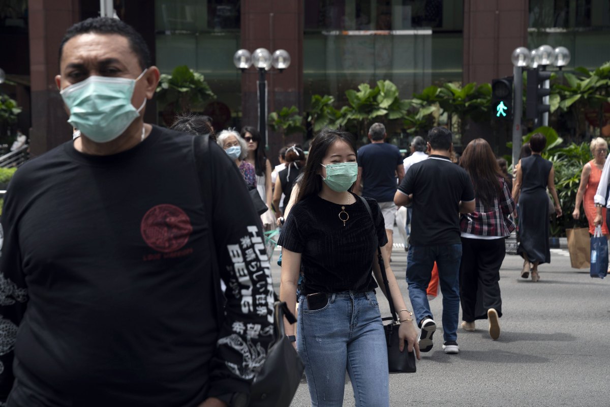 Covid cases spike in Hong Kong, Singapore as new wave spreads - THE EDGE SINGAPORE