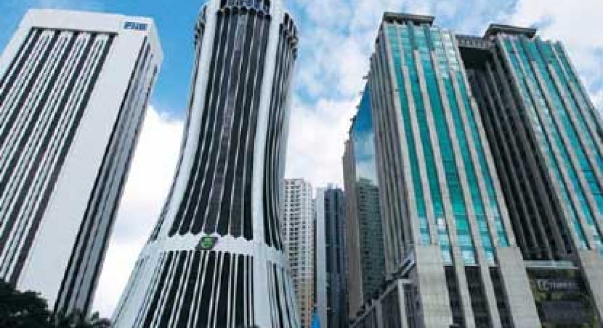 Tabung Haji’s HQ in KL (centre) … the pilgrim fund is a substantial shareholder in at least seven oil and gas companies