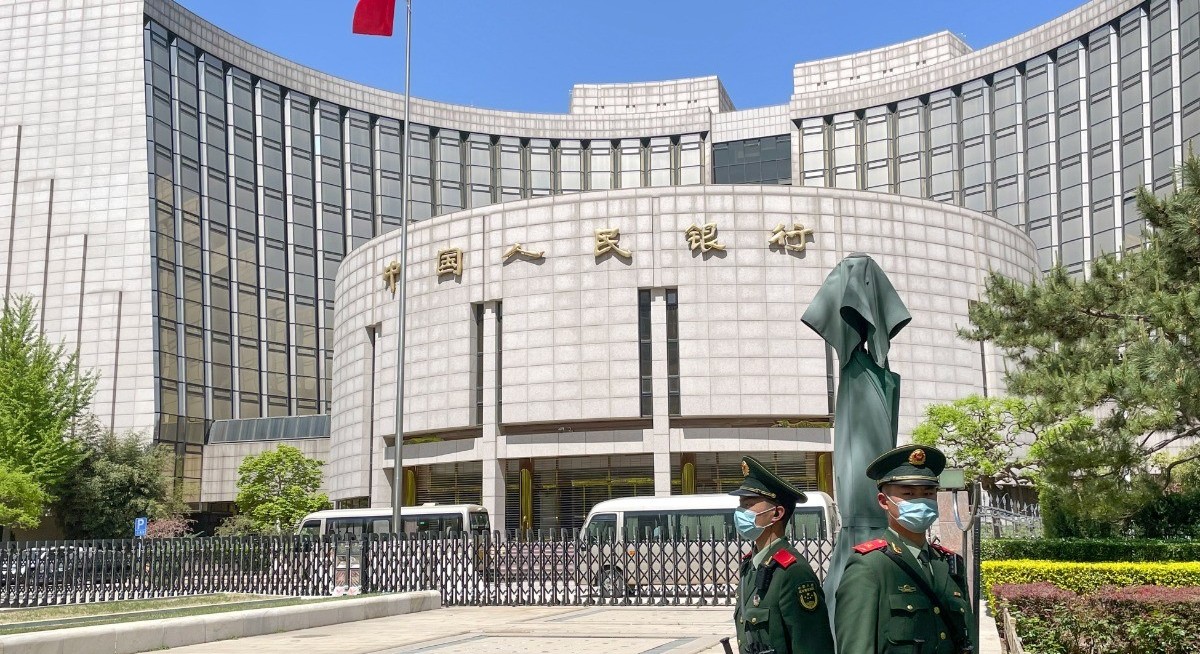 China lets policy loan rate fall to record low to boost economy