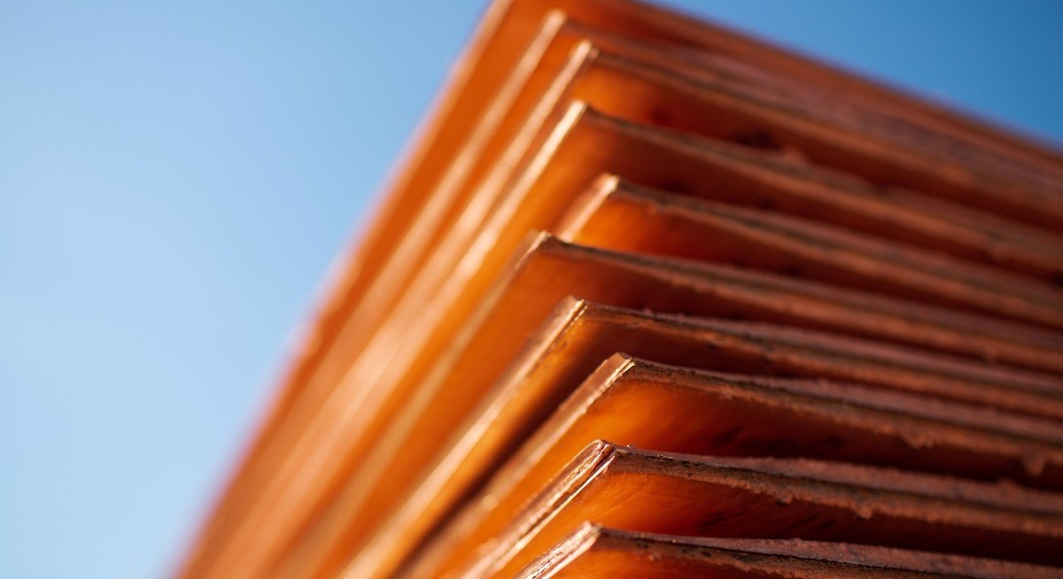 Copper gains on easing rate-hike bets and Chile mine avalanche
