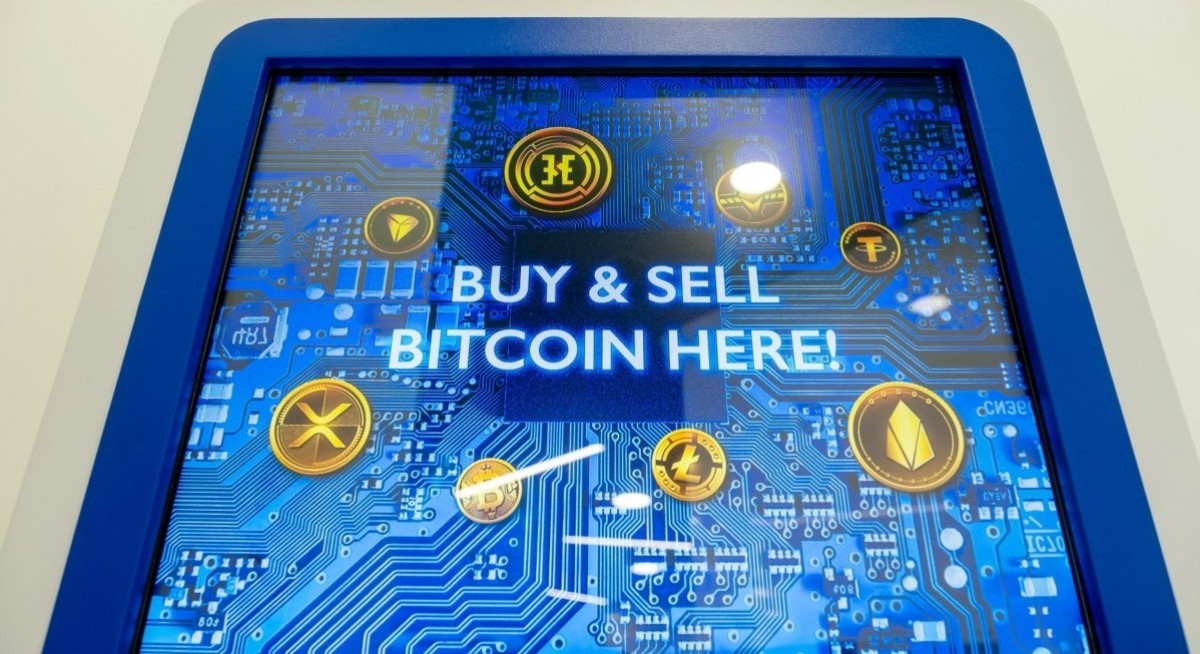 Bitcoin climbs to record high after futures-based ETF debut