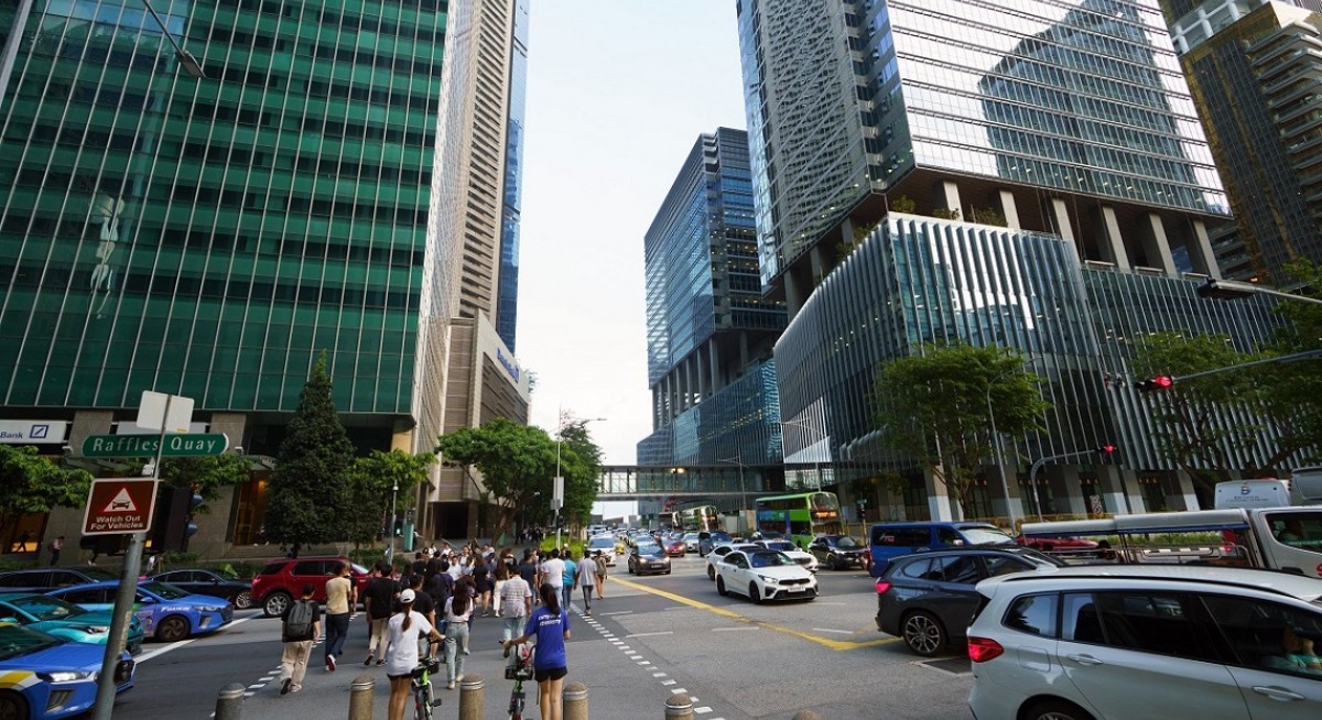 Singapore charges former director in record laundering case