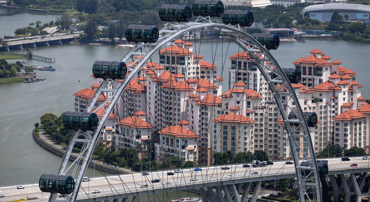 Singapore home sales surge to decade high, stoking curb concerns