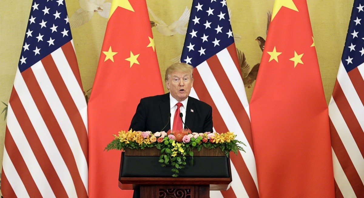 Trump softens tone on China to secure Xi summit, trade deal