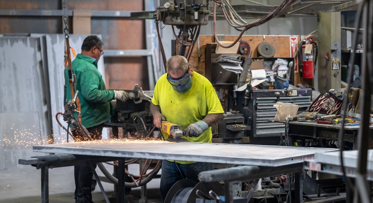 US business activity cools as growth of selling prices eases