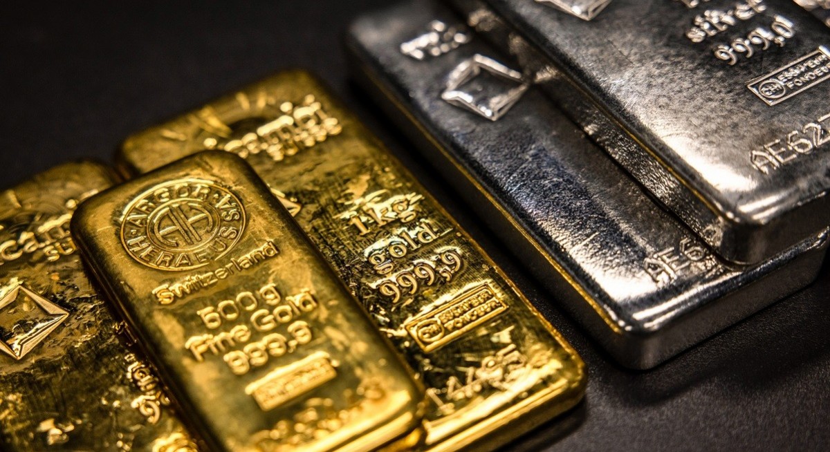 Gold and silver hit records on credit fears, US-China tensions