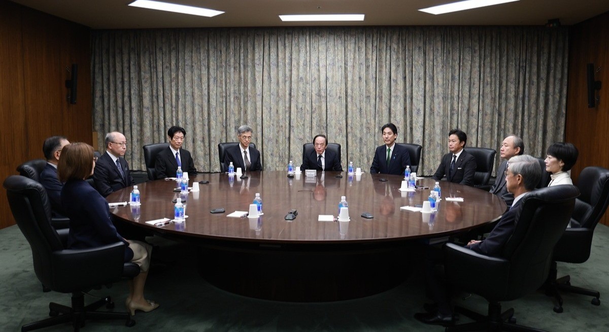 Bank of Japan sits tight with two holdouts