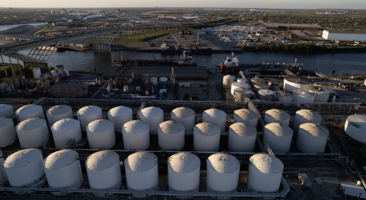 Oil holds near three-month low as Iran deal seen boosting supply