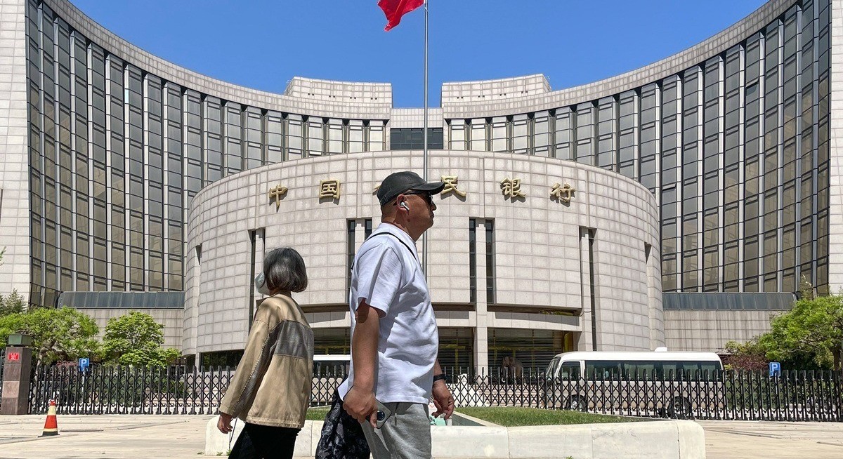 China central bank's new overnight rate said below forecasts in hint at easing