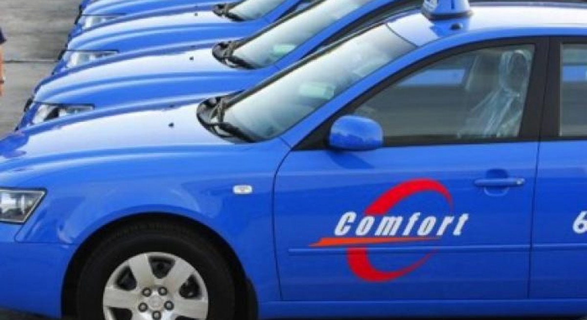 ComfortDelGro downgraded as taxi business slows 