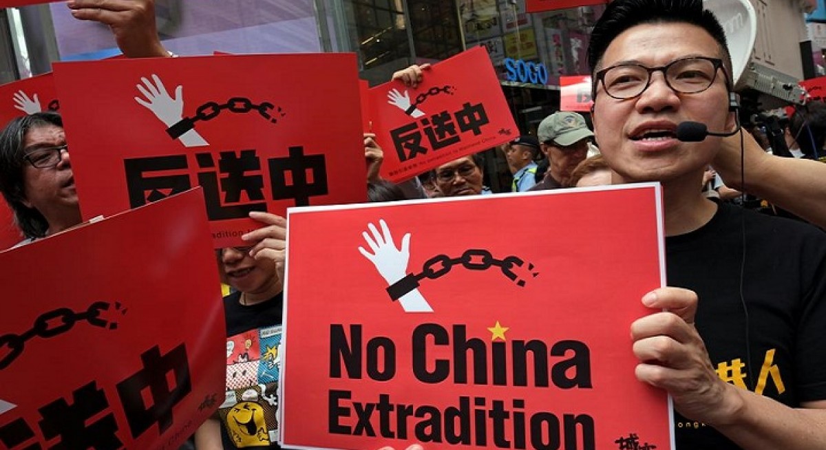 Hong Kong pushes bill allowing extraditions to China despite biggest protest since handover