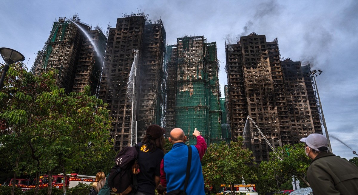 Hong Kong death toll rises to 94 with blaze near containment