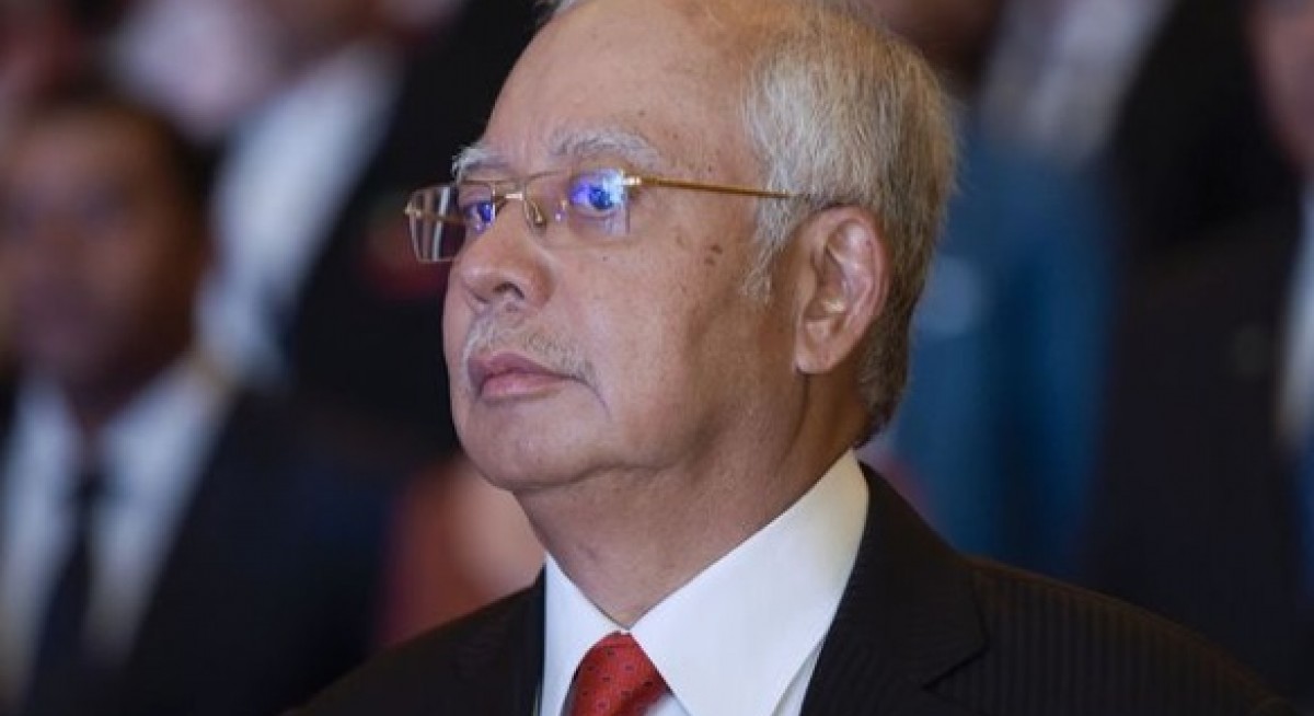 Najib looking at 21 charges in third arrest this year