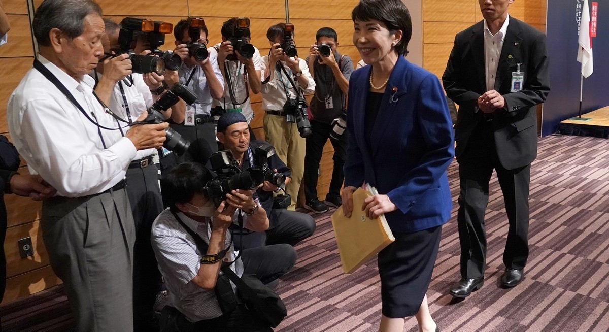 China escalates feud with Japan, probes chipmaking material