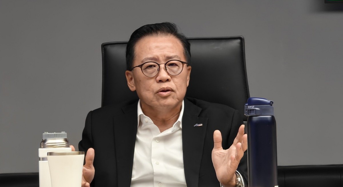 SingPost reports lower earnings, continues strategic review under new group CEO Chong