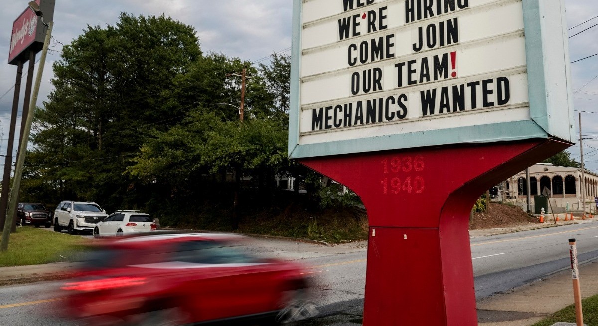 US job openings fall slightly in March as hiring rebounds