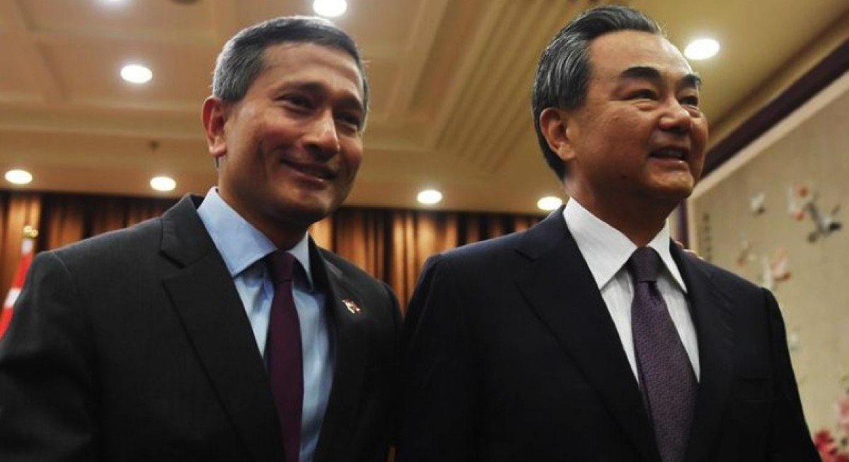 File photo of Wang Yi and Vivian Balakrishnan from Reuters