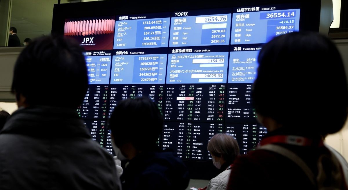 Asian stocks fall after weak US data; dollar gains