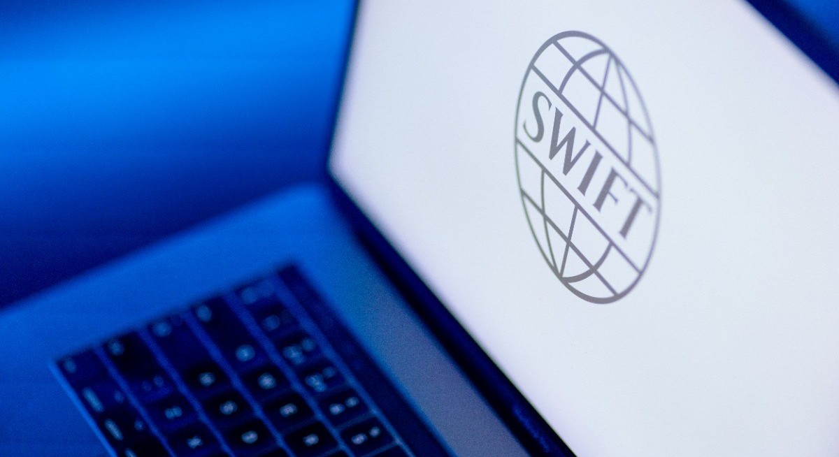 Swift unveils blockchain system for 24/7 cross-border payments