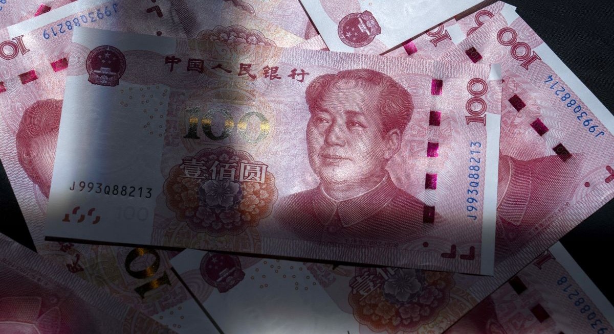 Chinese firms speed up dollar selling amid optimism towards yuan