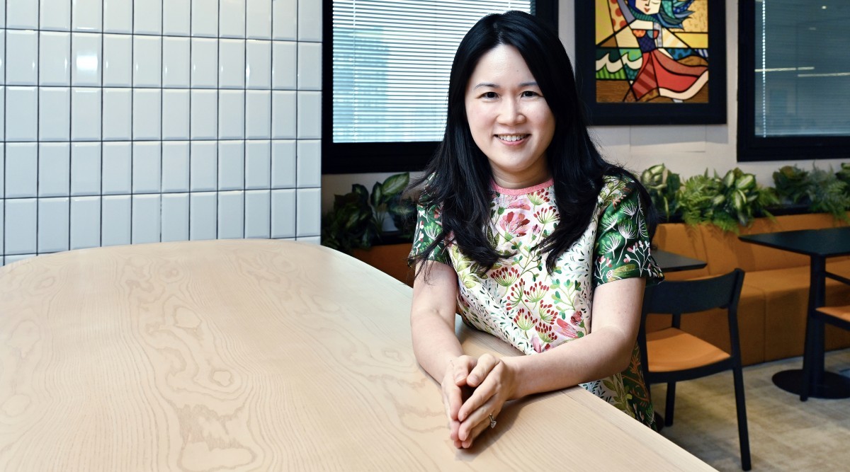 Adeline Sim is the chief corporate officer and executive director of HRnetGroup, the recruitment firm founded by her father, Peter Sim, in 1992. The company went public in 2017. Photo: Albert Chua/The Edge Singapore